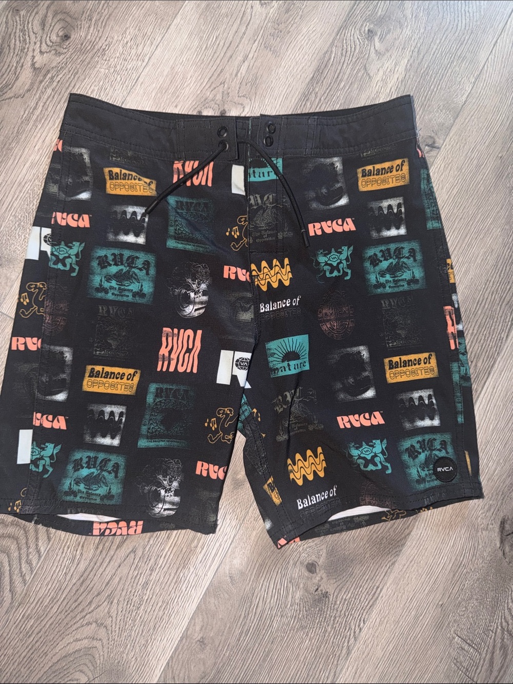 RVCA Men’s Black Graphic Swim Board Shorts with Teal, Orange & Yellow Accents